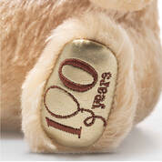 Disney Winnie the Pooh 100th Anniversary Musical Bear by Steiff 13047 0016 b closeup